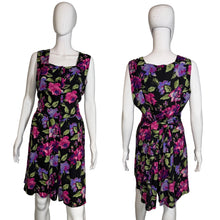 Load image into Gallery viewer, Floral romper on a mannequin against a neutral background
