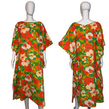 Load image into Gallery viewer, Colorful floral dress on a mannequin against a plain background
