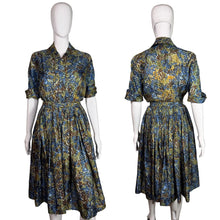 Load image into Gallery viewer, Floral dress on a mannequin with front and back views against a plain background
