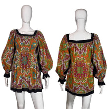 Load image into Gallery viewer, Colorful patterned dress on a mannequin against a plain background
