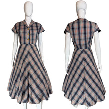 Load image into Gallery viewer, Plaid dress on a mannequin with a neutral background
