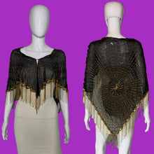 Load image into Gallery viewer, A black beaded mesh shawl with gold fringe and a spiderweb design, shown on a white mannequin from both front and back views.
