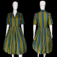 Load image into Gallery viewer, A short-sleeve collared dress with vertical blue and teal stripes on an olive green base, shown from both the front and back on a white mannequin.
