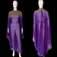 Load image into Gallery viewer, A purple sheer poncho-style dress displayed on a mannequin, showing both front and back views. 
