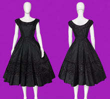 Load image into Gallery viewer, A black vintage A-line dress displayed on a white mannequin, showing both front and back views.
