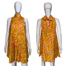 Load image into Gallery viewer, Mannequin wearing a colorful sleeveless dress with a pattern
