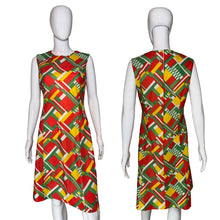 Load image into Gallery viewer, Colorful geometric-patterned dress on a mannequin 

