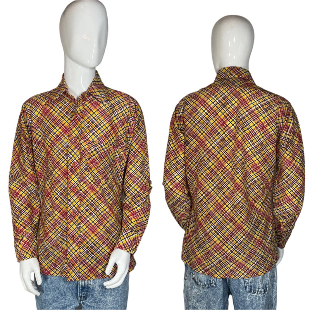 Plaid shirt on a mannequin with a gray background