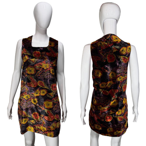 Floral patterned dress on a mannequin with a plain background