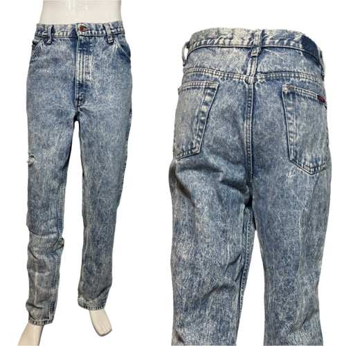 Pair of acid-wash jeans displayed on a mannequin against a plain background
