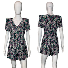 Load image into Gallery viewer, Floral dress on a mannequin against a plain background
