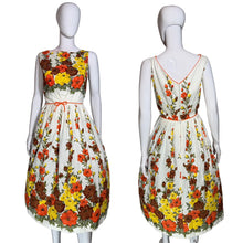 Load image into Gallery viewer, Floral dress on a mannequin against a plain background
