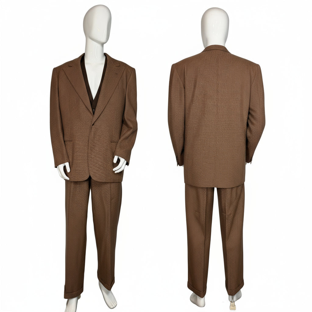 Brown suit displayed on a mannequin against a white wall.