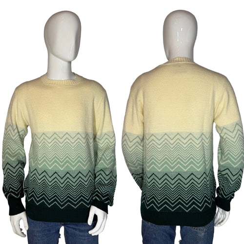 Two views of a sweater with a gradient pattern on a mannequin against a plain background.