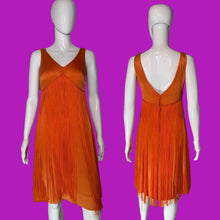 Load image into Gallery viewer, An orange sleeveless fringe dress shown on a white mannequin from both the front and back views.
