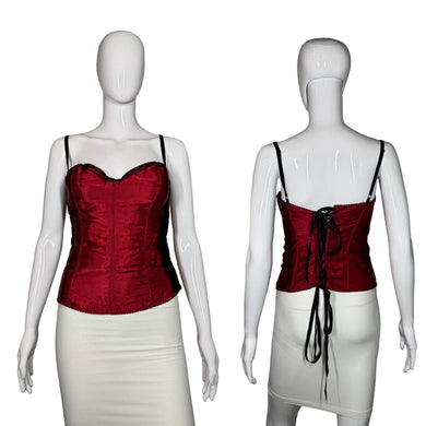 Red corset top on a mannequin against a gray background