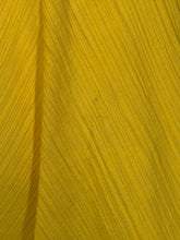 Load image into Gallery viewer, Close-up of yellow fabric texture with light discoloration
