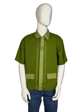 Load image into Gallery viewer, Green shirt on a mannequin against a plain background
