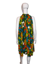 Load image into Gallery viewer, Colorful dress on a white surface with a neutral background
