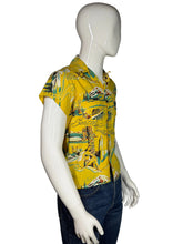Load image into Gallery viewer, Yellow patterned shirt on a mannequin against a white background

