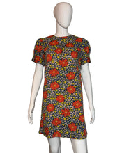 Load image into Gallery viewer, Floral-patterned dress on a mannequin against a plain background
