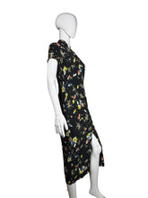 Load image into Gallery viewer, Mannequin wearing a black floral dress against a white wall.
