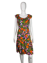Load image into Gallery viewer, Mannequin wearing a colorful floral dress against a plain background
