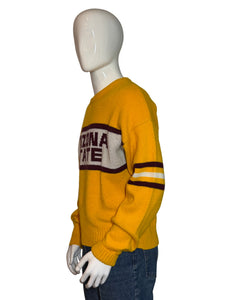 Yellow sweater with text on a mannequin against a plain background