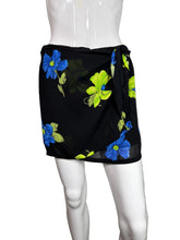 Load image into Gallery viewer, Black skirt with blue and green floral pattern on a mannequin against a plain background
