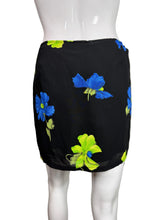 Load image into Gallery viewer, Black skirt with blue and green floral pattern on a mannequin against a plain background
