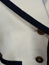 Load image into Gallery viewer, Close-up of a tiny spot of discoloration
