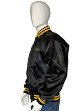 Load image into Gallery viewer, Mannequin wearing a black jacket with yellow accents on a white background

