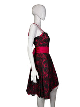 Load image into Gallery viewer, Mannequin wearing a red and black floral dress against a plain background
