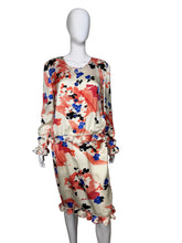 Load image into Gallery viewer, Floral dress on a mannequin against a plain background
