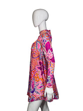 Load image into Gallery viewer, Mannequin wearing a colorful patterned garment on a white surface
