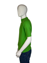 Load image into Gallery viewer, Mannequin wearing a green shirt and blue jeans on a white background
