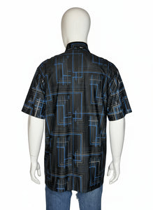 Black and blue geometric patterned shirt on a mannequin against a white background