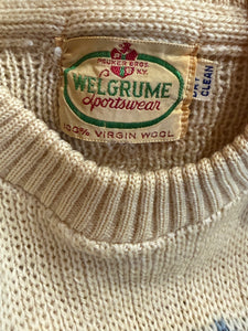 Close-up of a Welgrume label on a textured fabric background