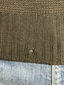 Close up of a small hole on the waistband