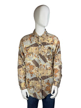 Load image into Gallery viewer, Mannequin wearing a patterned shirt against a plain background
