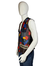 Load image into Gallery viewer, Mannequin wearing a colorful patchwork vest with a plain background
