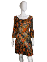 Load image into Gallery viewer, Mannequin wearing a floral dress with orange and black pattern against a plain background
