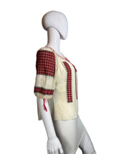 Load image into Gallery viewer, White peasant blouse with red accents on a mannequin against a white background

