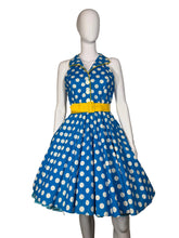 Load image into Gallery viewer, Blue polka dot dress on a mannequin against a plain background

