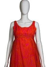 Load image into Gallery viewer, Mannequin wearing an orange and pink patterned dress on a plain background
