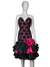 Load image into Gallery viewer, A mannequin wearing a black sequin and lace cocktail dress against a white background.
