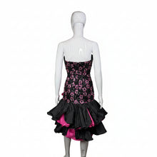 Load image into Gallery viewer, A mannequin wearing a black sequin and lace cocktail dress against a white background.

