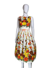 Load image into Gallery viewer, Floral dress on a mannequin against a white background
