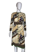 Load image into Gallery viewer, A patterned vintage dress against a white background.
