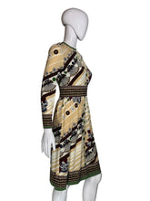 Load image into Gallery viewer, A patterned vintage dress against a white background.
